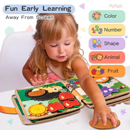 Toddler playing with the felt busy book